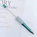 DIY beadable pen with dark green glitter finish and white pearl rhinestone accents - Teal