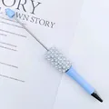 Light blue beaded ballpoint pen featuring white pearls and shimmering rhinestones - Aqua Blue