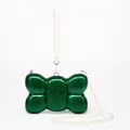Detail of emerald green glitter shell bag with pearl chain and luxury acrylic finish - Bow Shape Green Glitter