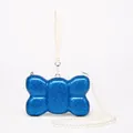 Detail of glittery blue bow-shaped acrylic clutch bag with pearl chain and leather strap - Bow Shape Blue Glitter