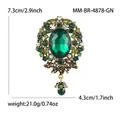 Broche barroco vintage con cristales esmeralda y colgante de gota dimensiones - Verde
