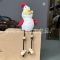 Close-up of resin chicken statue with long rope legs and quirky thick lips for garden decor - Red