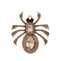Detailed macro view of vintage spider brooch with champagne rhinestones and red gem eyes - 3D Ornate Vintage Spider Brooch