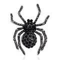 Macro shot of spider-shaped brooch with black pavé crystals and silver metal finish - Gothic Dark Style Black Spider Brooch