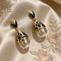 2605030 Waterdrop Pearl Blue Glazed Earrings