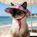 Floral pet baseball hat in red fabric with adjustable strap worn by a Siamese cat - S / Pink Floral