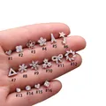 Selezione di 16 orecchini a vite argento con zirconi cubici micro-intarsiati - Argento