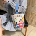 Canvas bucket bag with funny cartoon prints and wooden ring handles for women - Cute Monster Carnival