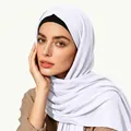 Close-up of white ethnic hijab scarf with soft pleated texture and black headband - One Size / White