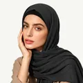 Detail of dark charcoal jersey hijab scarf with black undercap showing fabric texture - One Size / Black