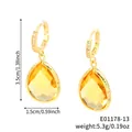 Goldene Creolen mit gelben Steinen in Birnenform und weißen Zirkonia-Akzenten - 16K Gold - Champagner
