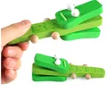 Green wooden crocodile hand castanet rhythm toy for toddler sensory development - Green Crocodile Castanet