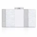 Detail of acrylic evening clutch with marble texture and silver glitter patchwork - White
