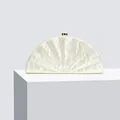 Detail view of pearlescent white acrylic fan-shaped evening clutch with gold metal clasp - White Pearlescent Fan Texture / Milky White