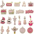 Pink and gold enamel music charms set featuring guitars, notes, and radio for DIY jewelry - Pink Musical Theme Charms Set