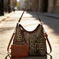 Detail of hobo bag with leopard print patchwork and a matching small zippered pouch - Dark Brown Leopard Print Nested Bag Set