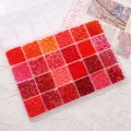 24-grid jewelry making kit featuring a variety of red and coral beads in a clear organizer - Red Series