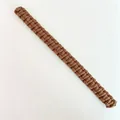 Detail of brown handcrafted cotton rope curtain tieback with woven cobra knot pattern - Long Style / Caramel color