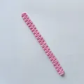 Pink handmade woven cotton curtain tieback featuring a bohemian braided texture - Long Style / Pink