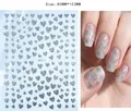 Detail view of glitter silver heart nail stickers with product dimensions and usage - Silver