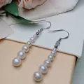 Detailed macro shot of S925 sterling silver hooks and gradient white freshwater pearls - Gradient Pearl - Silver (925 Sterling Silver Earring Post)