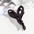 Glossy deep purple hair claw clip with a streamlined intertwined design for women - Twisted Style / Deep purple