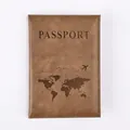 Detail of brown PU leather passport holder with embossed world map and stitching - Khaki
