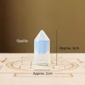 Single hexagonal opalite crystal point with milky blue luster on carved wooden base - Opal Pillar / 3.5cm