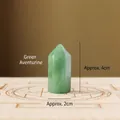 Polished Green Aventurine hexagonal crystal point standing on a carved wooden base - Green Aventurine Pillar / 3.5cm
