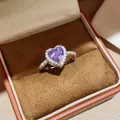 Detail of 18k gold plated heart ring with purple zircon in a brown velvet jewelry box - One Size(Adjustable) / Silver Purple Zirconia