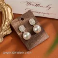 Elegantes pendientes de perlas en plata S925 bañada en oro con circonitas cúbicas - Moda Zirconia Perla / Dorado