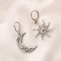 Asymmetric silver sun and moon dangle earrings with polished celestial charms - White K (K-899)
