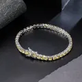 Tennis bracelet with yellow stones and silver box clasp on dark textured background - Bracelet / Width 4mm, Length approx 16cm / Silver (Yellow Zirconia)
