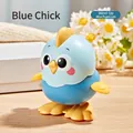 Blue clockwork chick toy for babies with a mechanical wind-up knob on wood surface - Wind-up Jumping Chick (Blue)