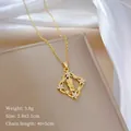 Detail of gold pendant necklace showing square relief and dimensions 2.8x2.1cm - Virgin Mary Flower Hollow Square Plate Style(7)
