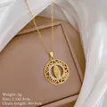 Detail of a gold Virgin Mary pendant with cubic zirconia inlay and product dimensions - Virgin Mary Round Hollow Style(19)
