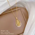 Detailed view of Virgin Mary gold pendant with sparkling micro-inlaid cubic zirconia - Virgin Mary Oval with Zircon Embellishment Style(21)