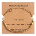 Detail of gold Morse code bead bracelet with Keep going text on handmade display card - Gold (Keep Going)