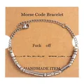 Detail of silver Morse Code bracelet on kraft paper card with Fuck off message engraving - Silver (Fuck Off)