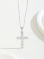 Silver cross pendant necklace with micro-paved cubic zirconia on a white textured background - W101-pj0946-sl