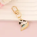 Cartoon cat reading a book metal keychain with gold plating and enamel pendant decoration - Cat Reading with Magnifying Glass
