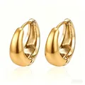 Close-up of minimalist 18K gold plated stainless steel hoop earrings for women - 16mm Gold Huggie Medium (MS-283) / 18K Gold / Gold