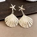 Eleganti orecchini pendenti dorati oversize con stella marina e conchiglia moda - Stile Stella Marina Conchiglia (3#) / Oro