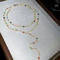 Détail du collier en Y en cristal coloré avec d'élégants segments de chaîne en cœur doré - Collier en Y Rond (3#) / Coloré / Or