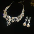 Detailed view of elegant rhinestone water drop necklace and earring set on black background. - Necklace And Earrings Set (4#) / Silver