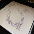 Detail showing elegant pink rhinestone flower necklace and matching earrings on display - Pink Floral Rhinestone Style (16#)