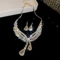 Macro view showing the sparkling details of the rhinestone water-drop necklace and earring set - Crisscross Water Drop Pave Style (25#)
