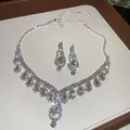 Sparkling silver-tone necklace and teardrop earring set with brilliant rhinestones - V-Shape Symmetrical Fringe Style (30#)