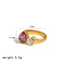 Macro detail of 18k gold plated stainless steel ring with pink and clear pear zircons - Pear-Shaped Purple and White Stone Style (TR4567-PW)
