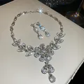 Elegant rhinestone water-drop necklace and earrings set with sparkling flower design. - Floral Water Drop Pave Style (31#)